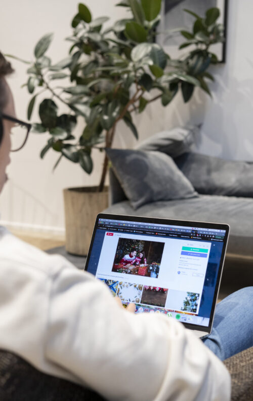 man-working-from-home-while-sitting-armchair
