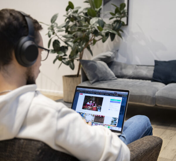 man-working-from-home-while-sitting-armchair