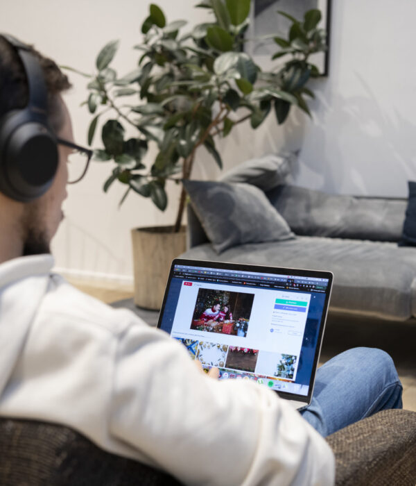 man-working-from-home-while-sitting-armchair