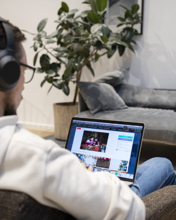 man-working-from-home-while-sitting-armchair